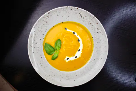 Pumpkin soup with parmesan and pumpkin seeds