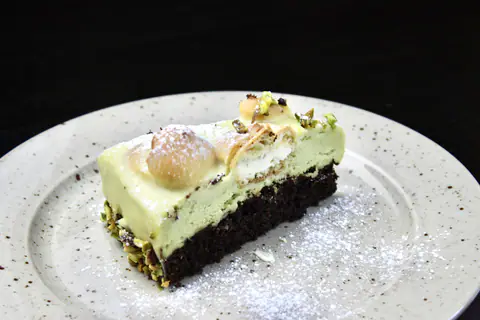 Pistachio profiterole cake