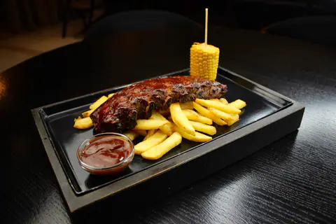 Grilled pork ribs in BBQ sauce