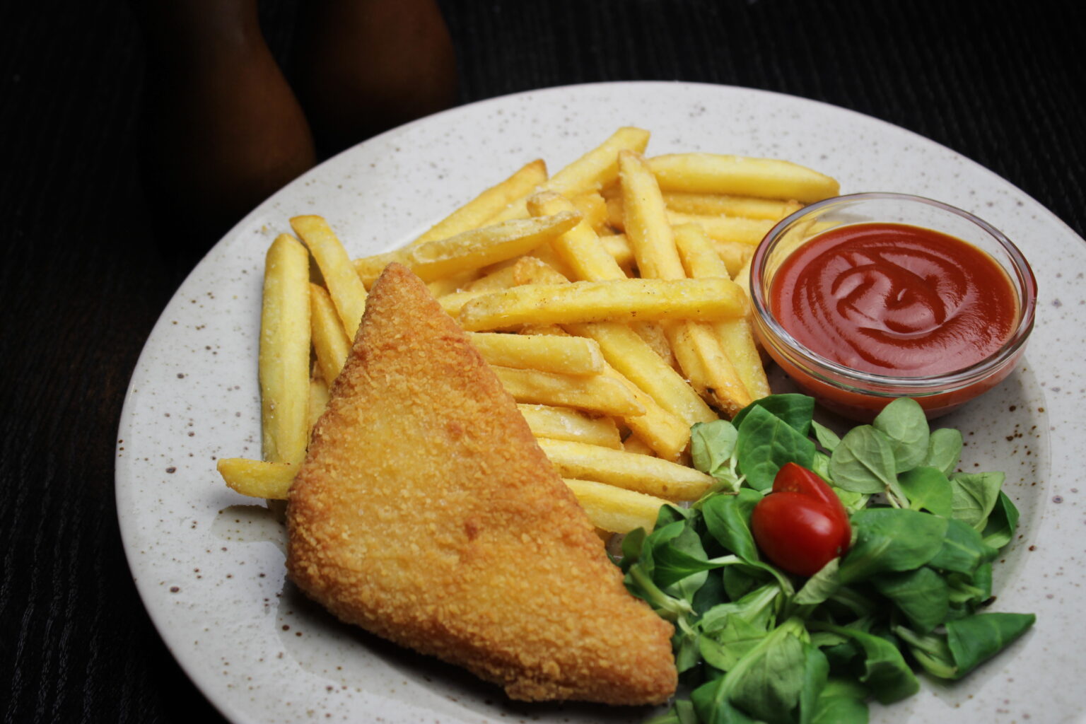 Smažený sýr (fried cheese) with chips and sauce – a popular Czech dish