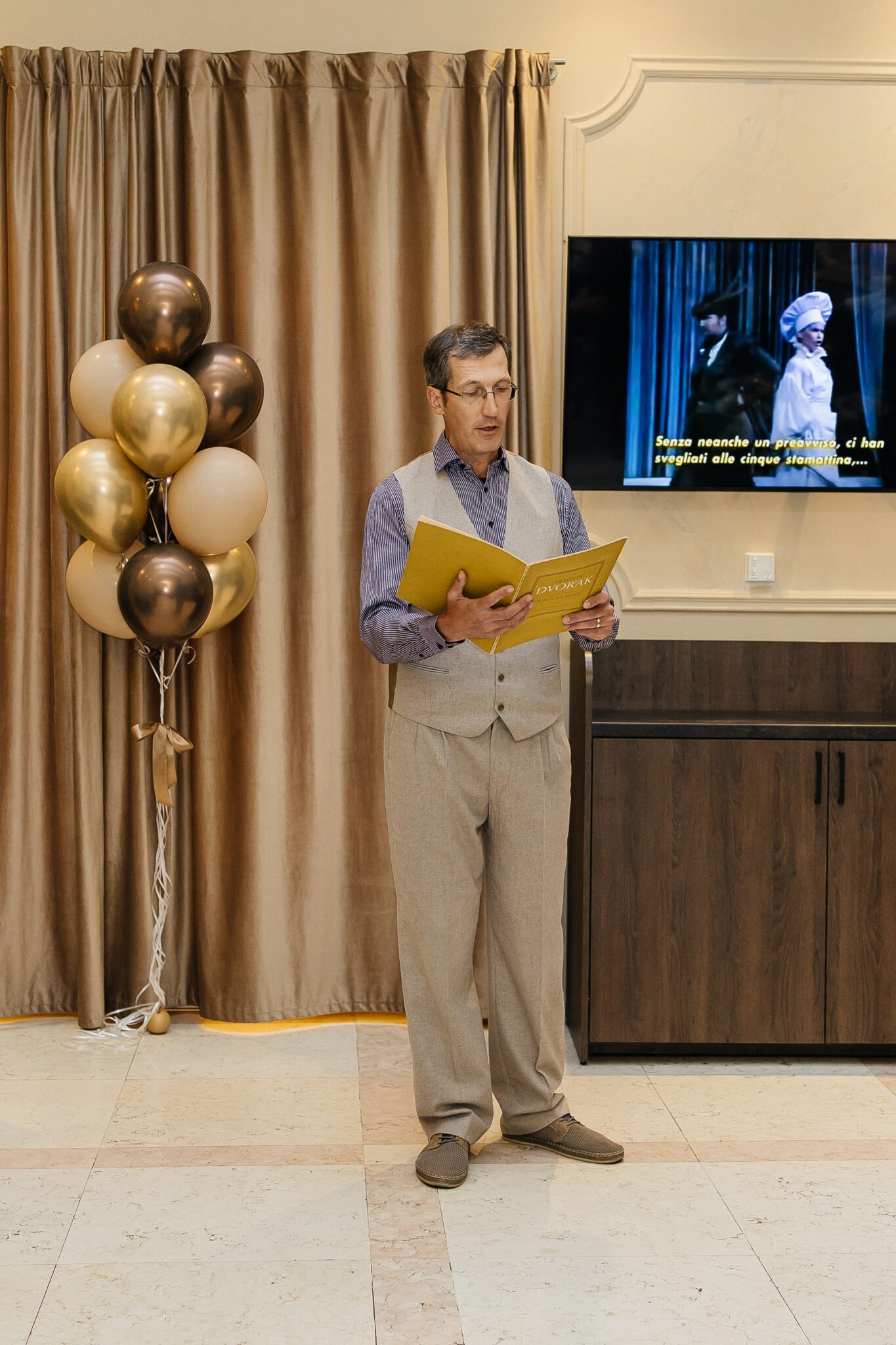 A singer from a Prague theatre performing a piece by Antonín Dvořák at the official opening of the A. Dvořák brewery restaurant and museum in Prague.