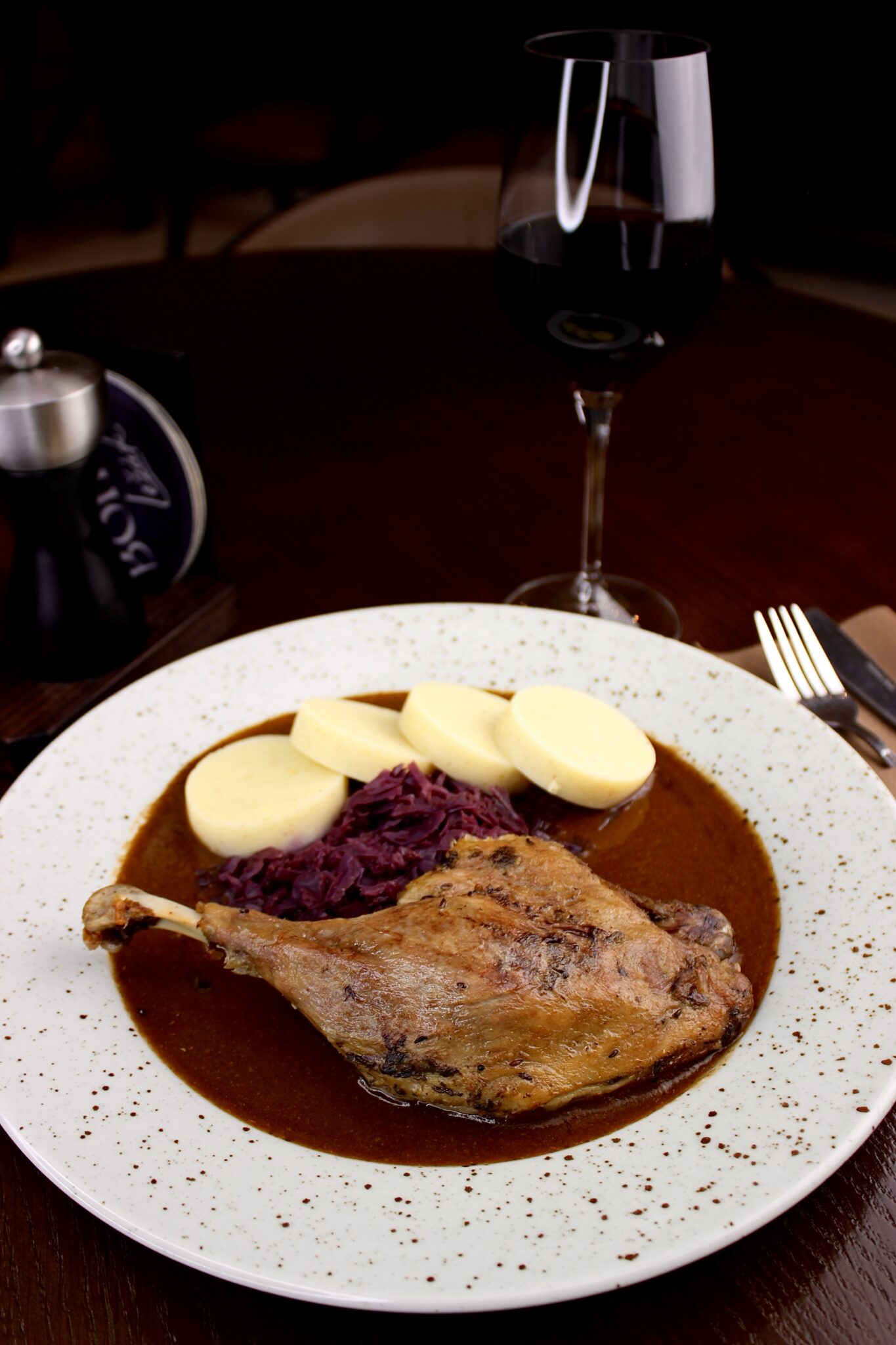 St Martin's goose with red cabbage, bread dumplings and a glass of red wine – the traditional St Martin's menu at the A. Dvořák restaurant, Prague 1